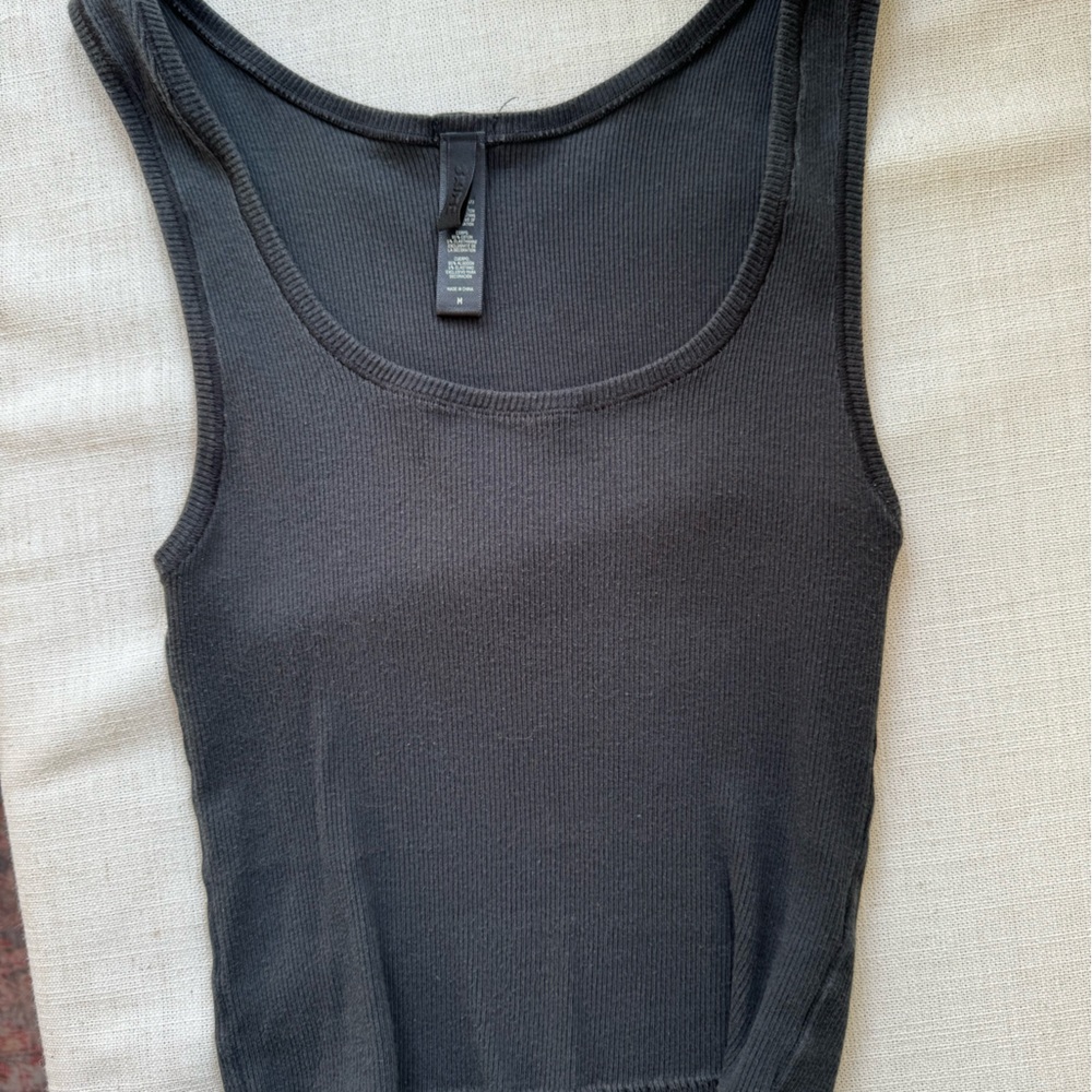 Skims black tank top